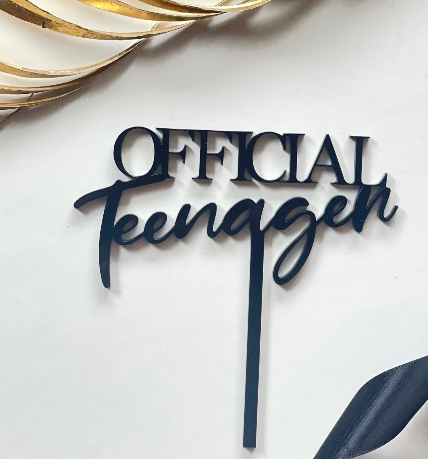 Official teenager acrylic topper.