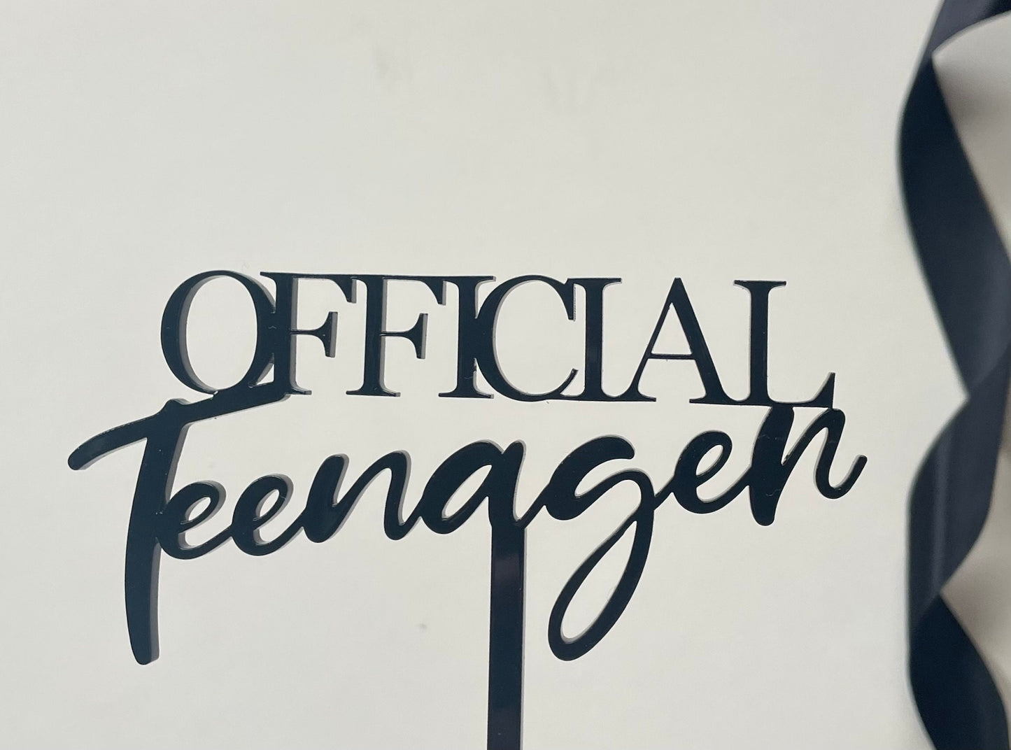 Official teenager acrylic topper.