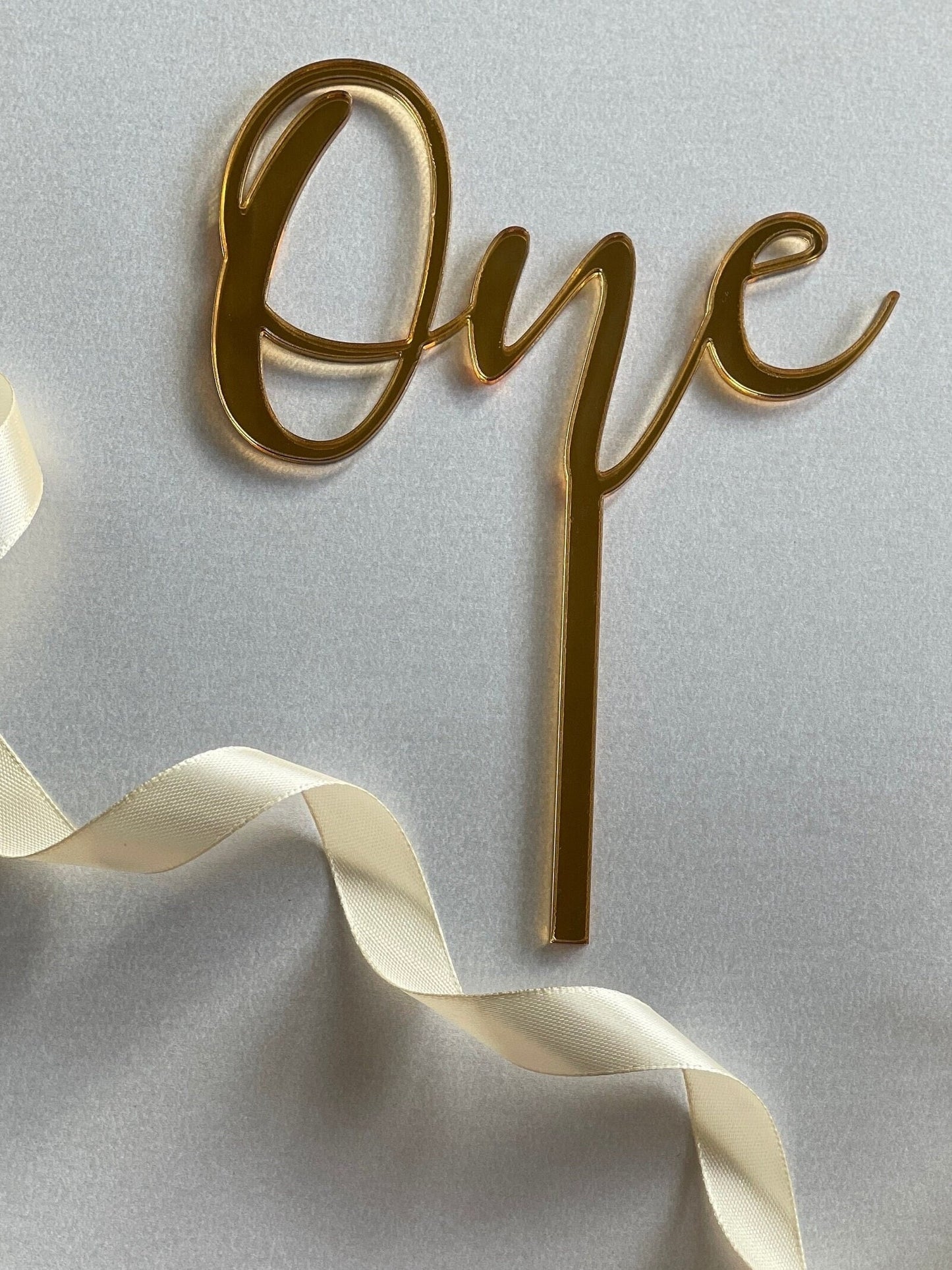 One cake topper. Mirrored acrylic topper. One  cake charm